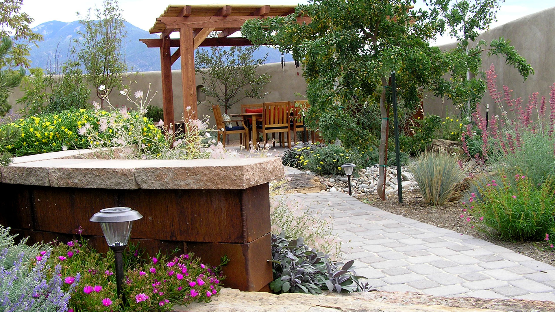 Gecko Landscaping Inc. Hardscaping, Stone Patios and Outdoor Kitchens slide 1